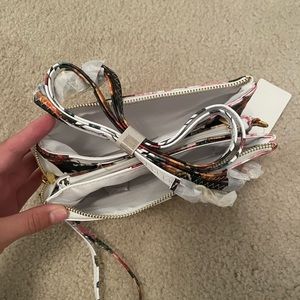 Brand new wristlet/ cross body purse.